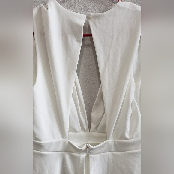 Lyaner  white layered romper with plunging neckline and button back size medium. - Picture 3 of 6